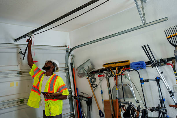 Professional Garage Door Panel Replacement technician working in Champaign County County, IL